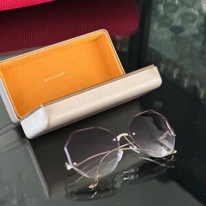 BGLVARI rimless sunglasses. No scratches. Excellent condition.